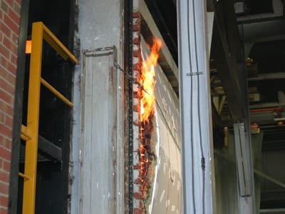 Fire behind wall.